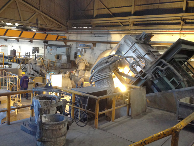 continuous casting - pouring from induction furnace to continuous casting